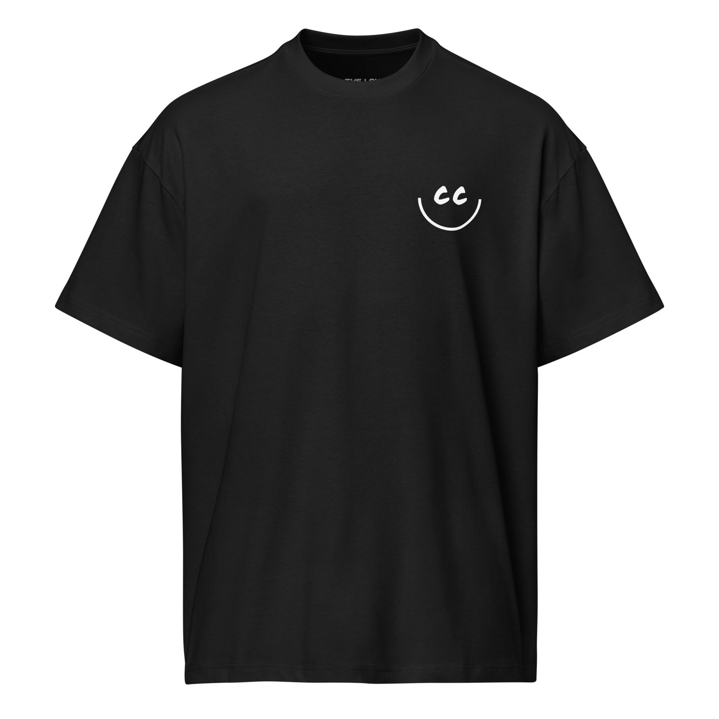 Less Obvious black relaxed t-shirt with a minimalist CC smile design located on the left chest pocket area.