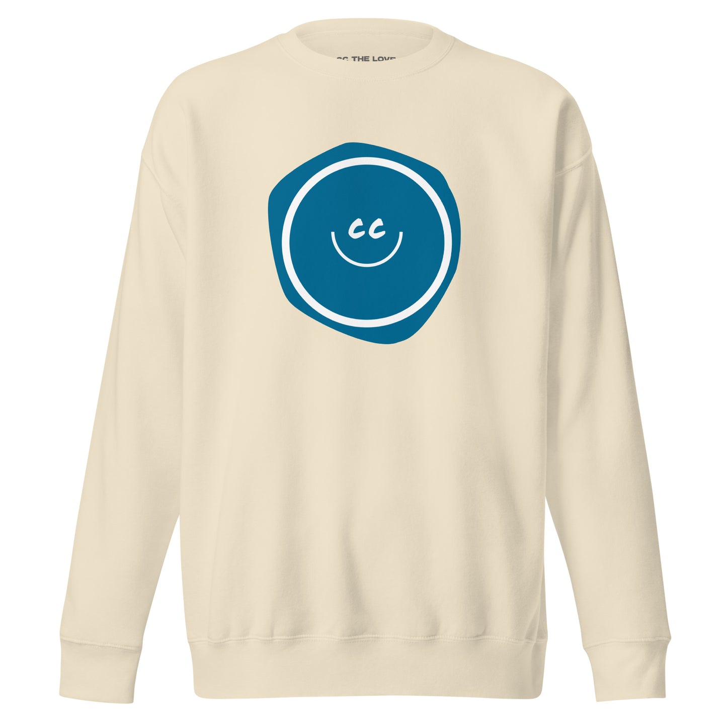 Actually Cerulean premium bone sweatshirt featuring the CC smile over an imperfect cerulean blue blob.