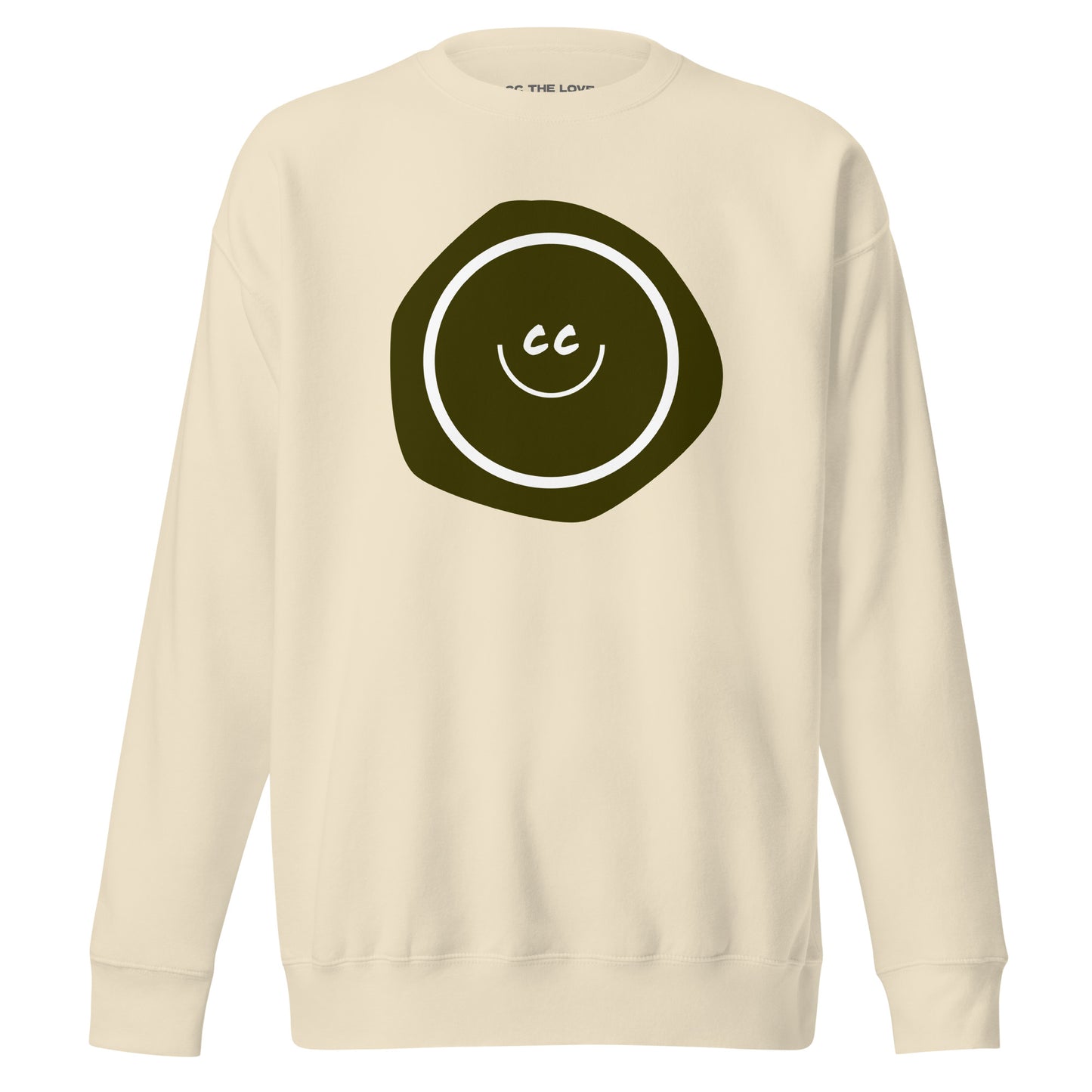 Grouchy Green premium bone sweatshirt featuring an earthy green imperfect shape behind the CC smile.