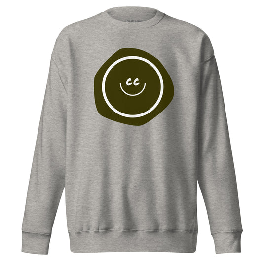 Grouchy Green premium carbon grey sweatshirt featuring an earthy green imperfect shape behind the CC smile.