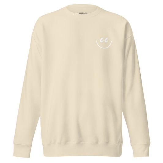 Less Obvious bone sweatshirt with a minimalist CC smile design located on the left chest pocket area.