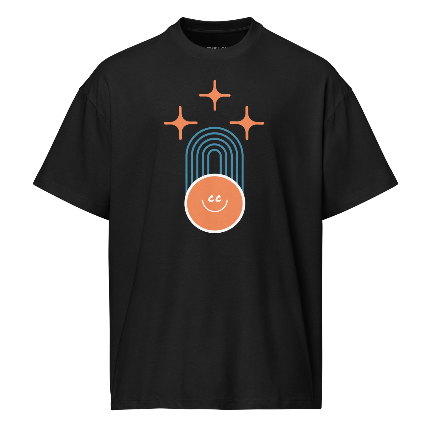 Shared Heritage tee in black, featuring geometric parallel lines, stars above, and the CC smile at the base.