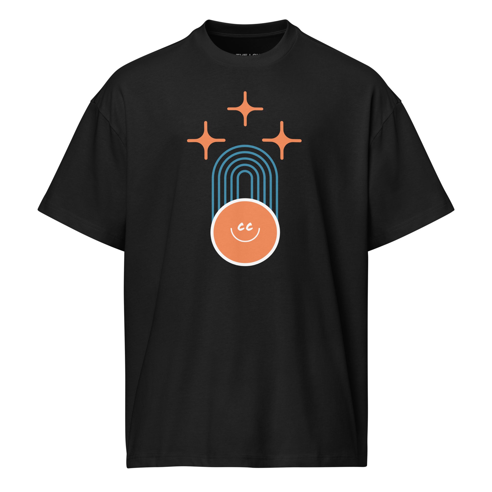 Shared Heritage tee in black, featuring geometric parallel lines, stars above, and the CC smile at the base.