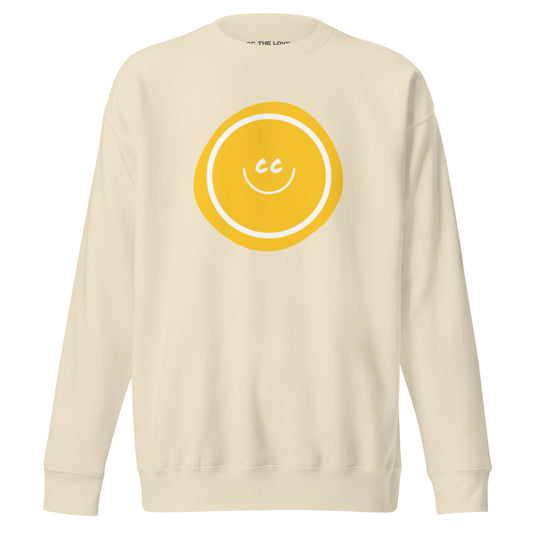 Yellow Hello premium heavyweight bone sweatshirt featuring an artistic wonky yellow circle behind the CC smile.