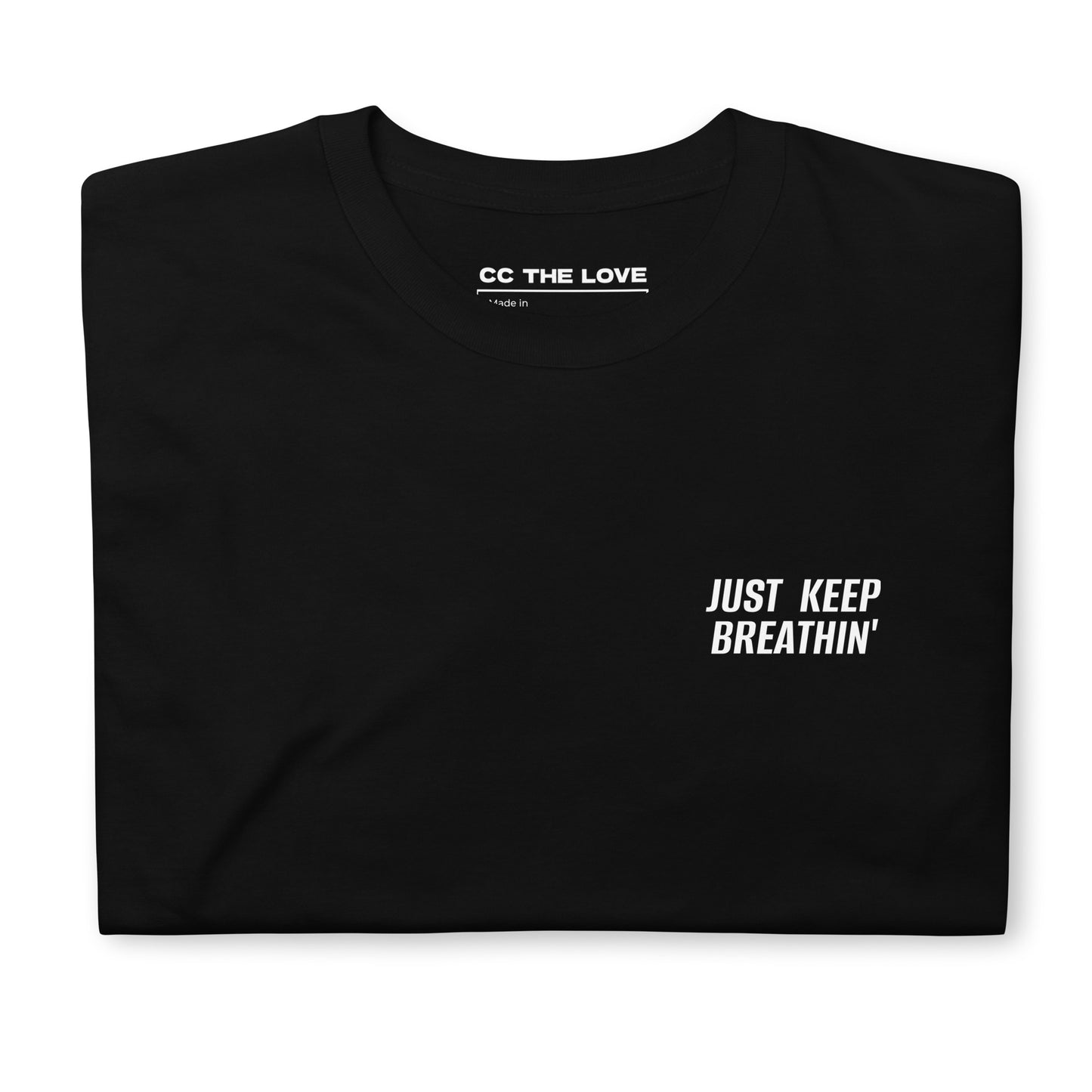Black t-shirt with 'Just Keep Breathin'' in white text, minimalist design