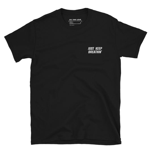 Black t-shirt with 'Just Keep Breathin'' in white text, minimalist design on chest