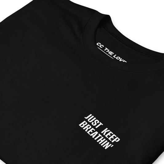 Black t-shirt with 'Just Keep Breathin'' in white text, minimalist design