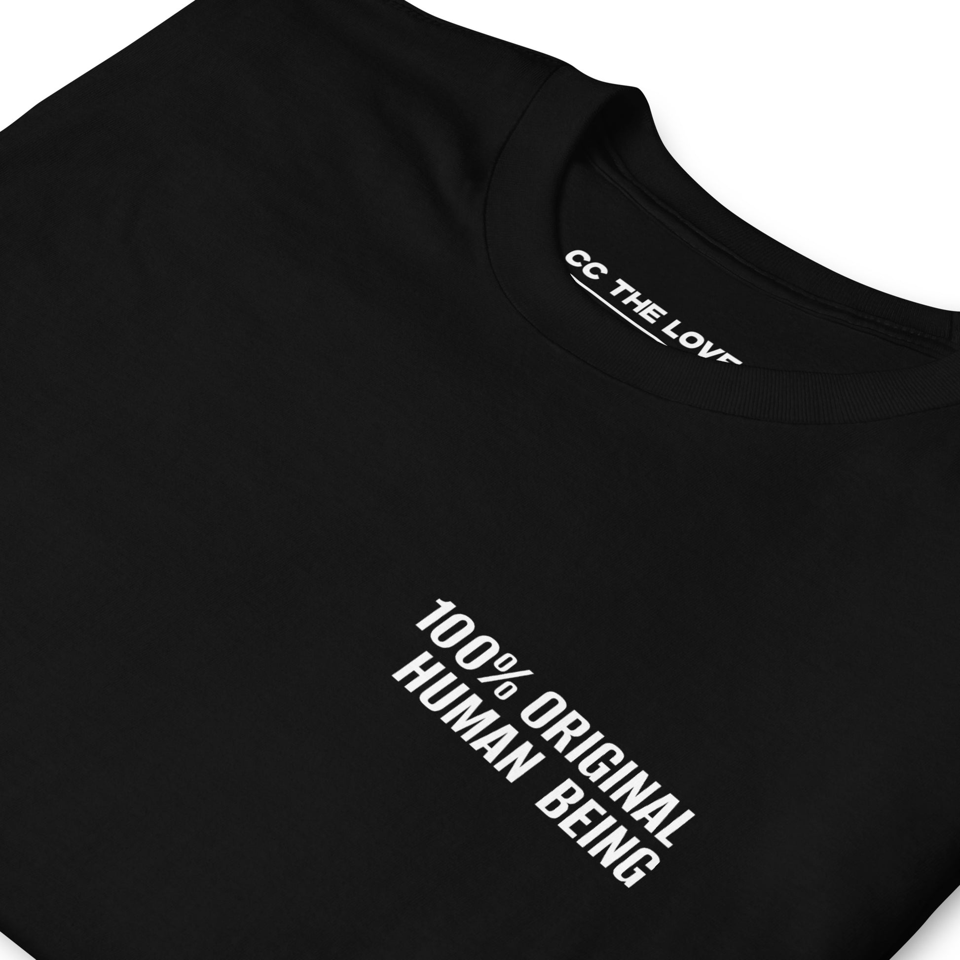Black t-shirt with '100% Original Human Being' in white text