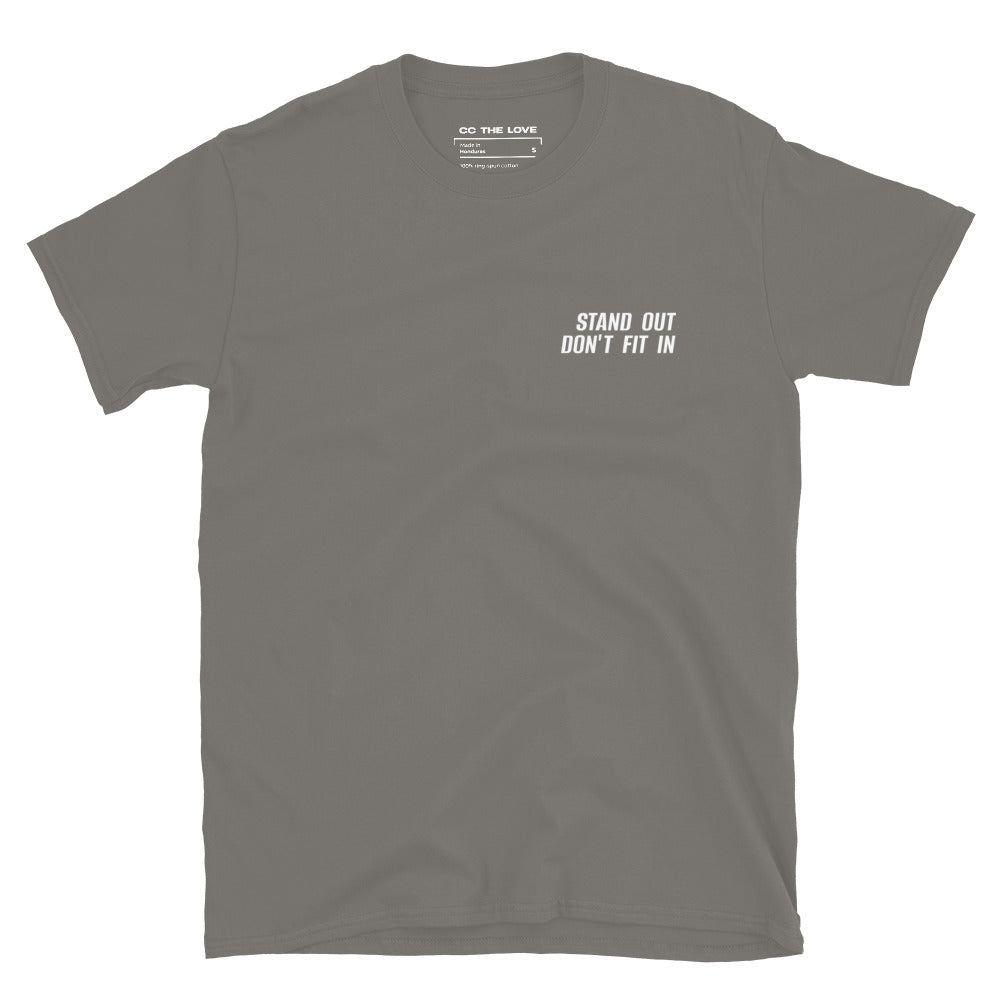 Charcoal t-shirt with 'Stand Out. Don't Fit In' in white text, minimalist design on chest.