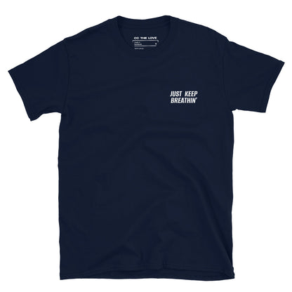 Navy t-shirt with 'Just Keep Breathin'' in white text, minimalist design on chest.