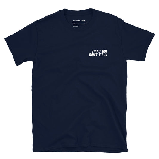 Navy t-shirt with 'Stand Out. Don't Fit In' in white text, minimalist design on chest.